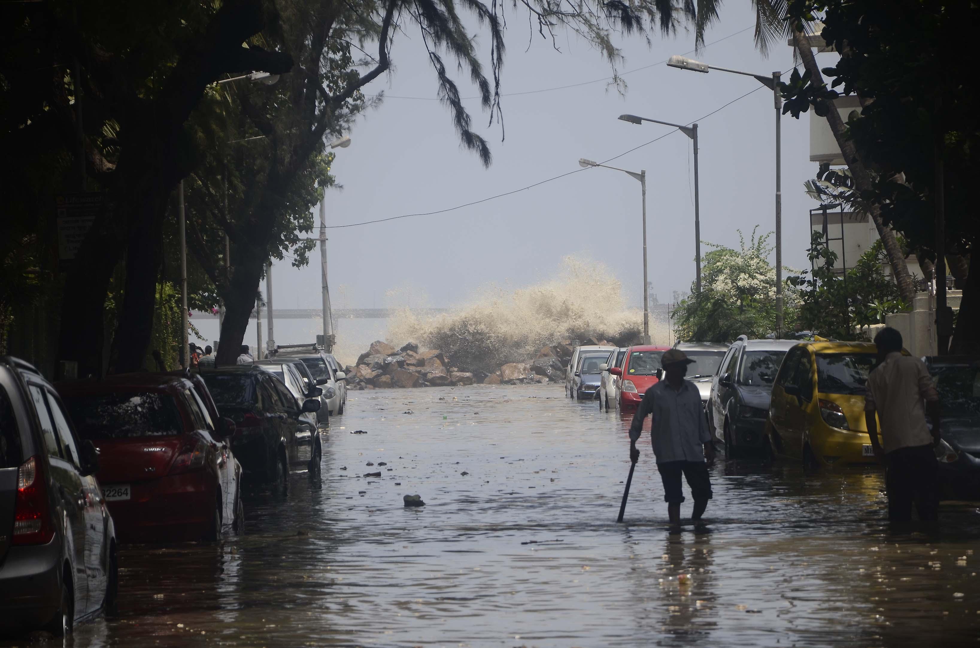 Monsoon elusive, Mumbai flooded by tidal waves